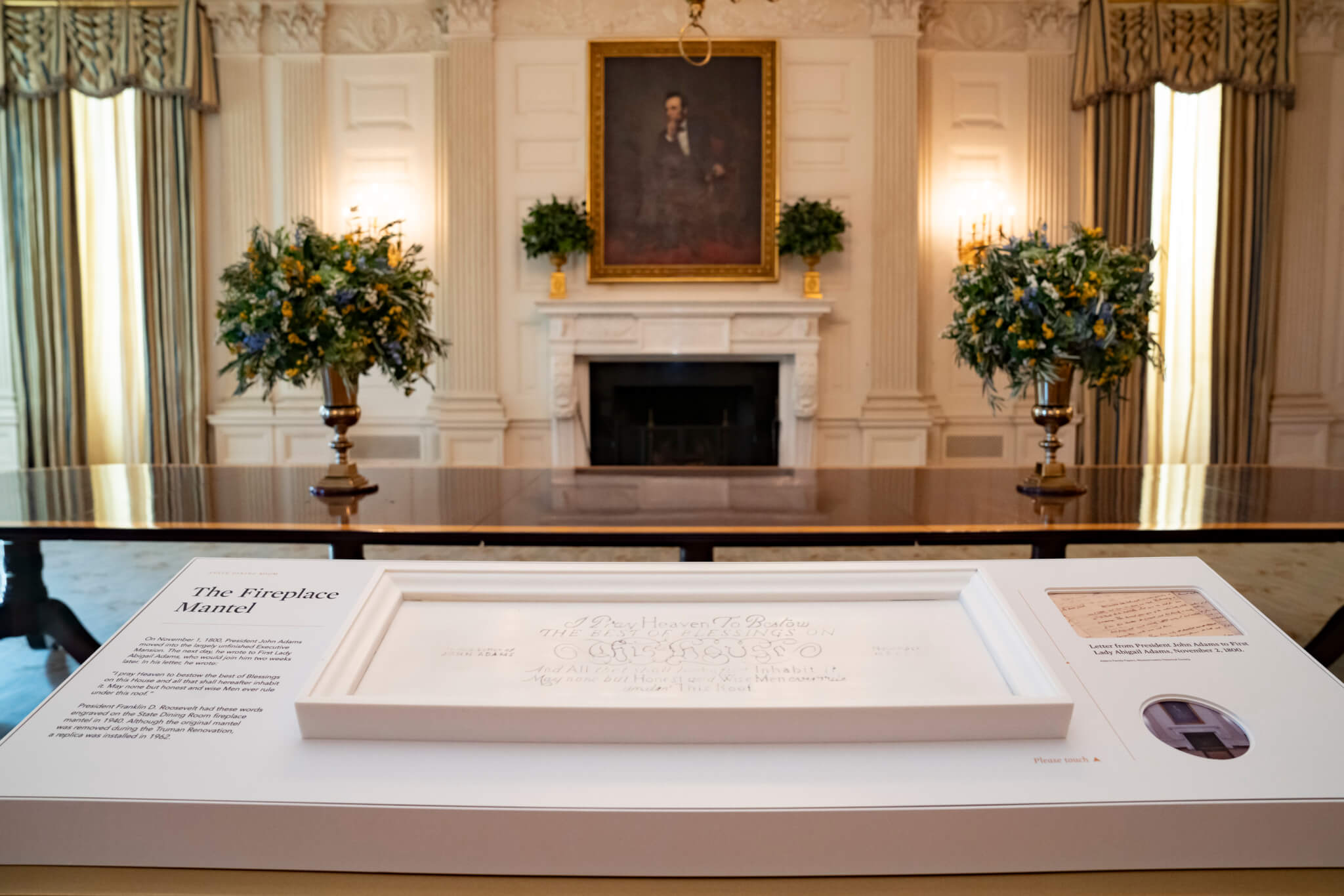 fireplace with historic painting