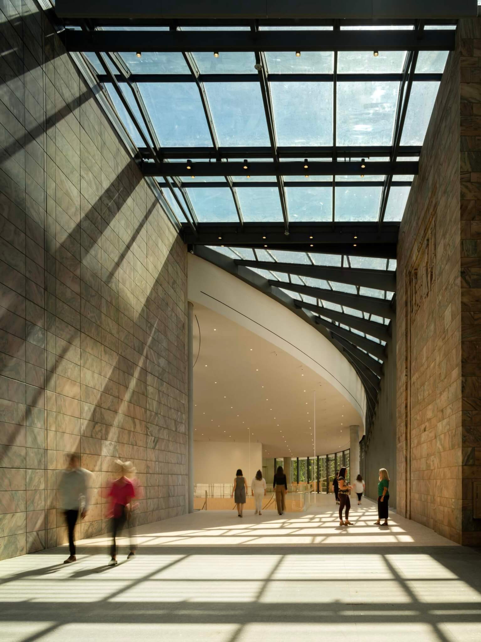 interior of museum with glass skylights above