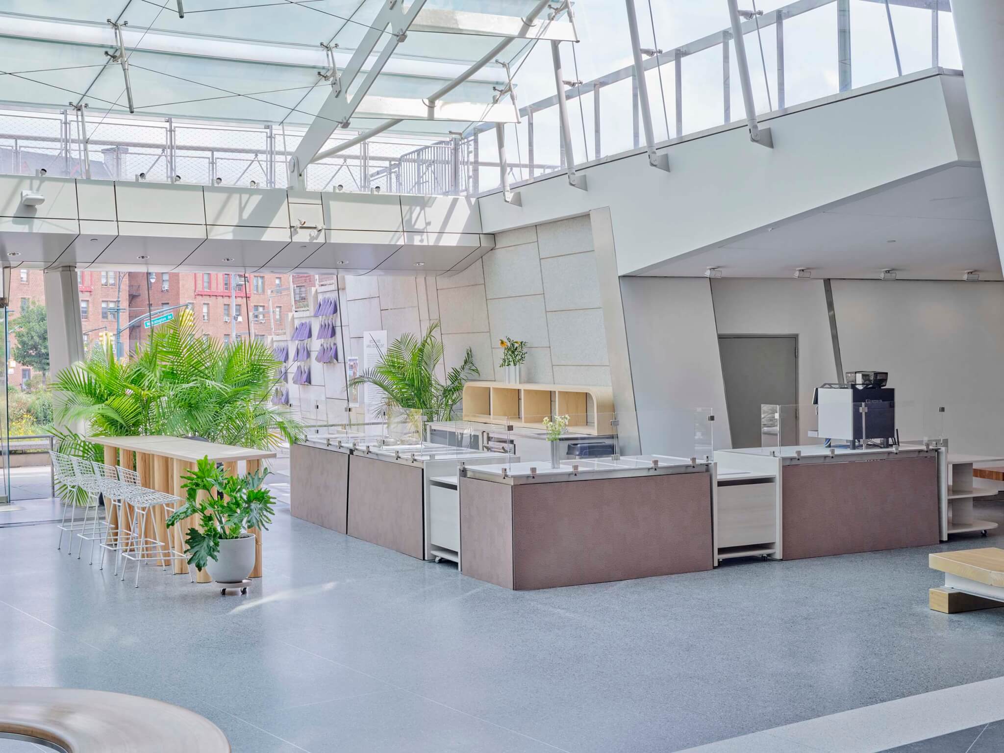 view of kitchen and display counter in new Brooklyn Museum cafe by Office of Tangible Space