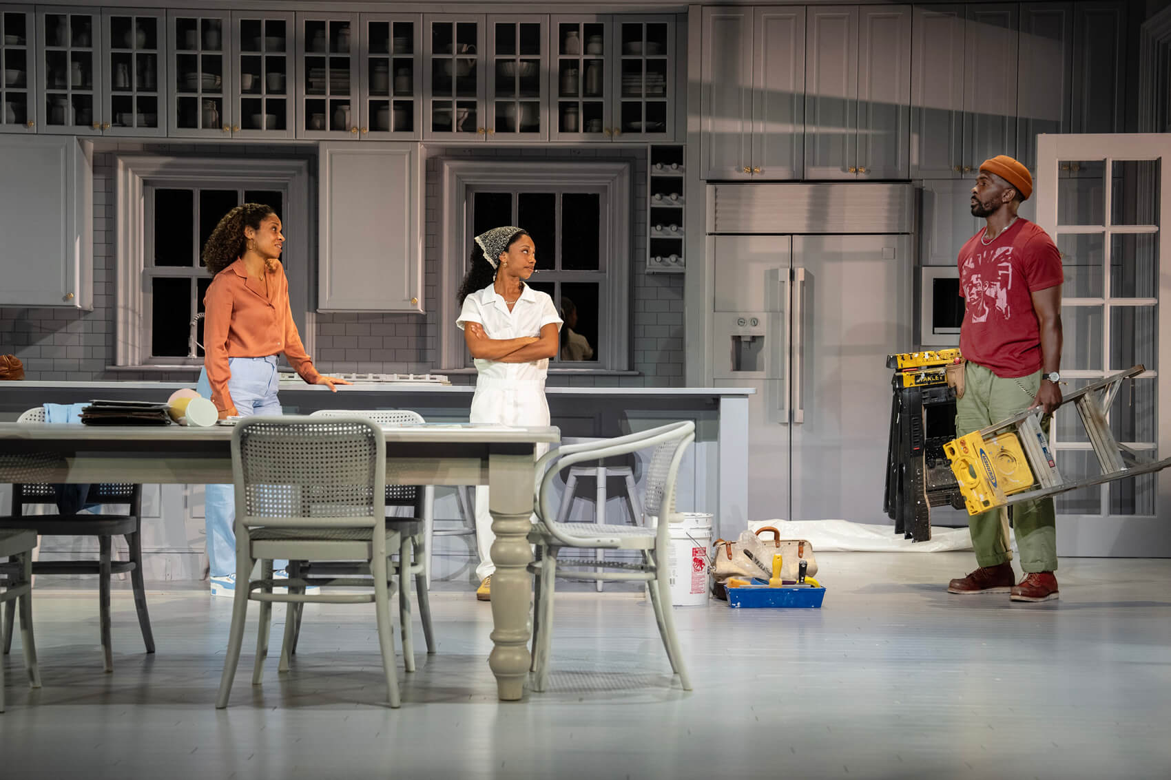 actors standing on the set of the play Good Bones