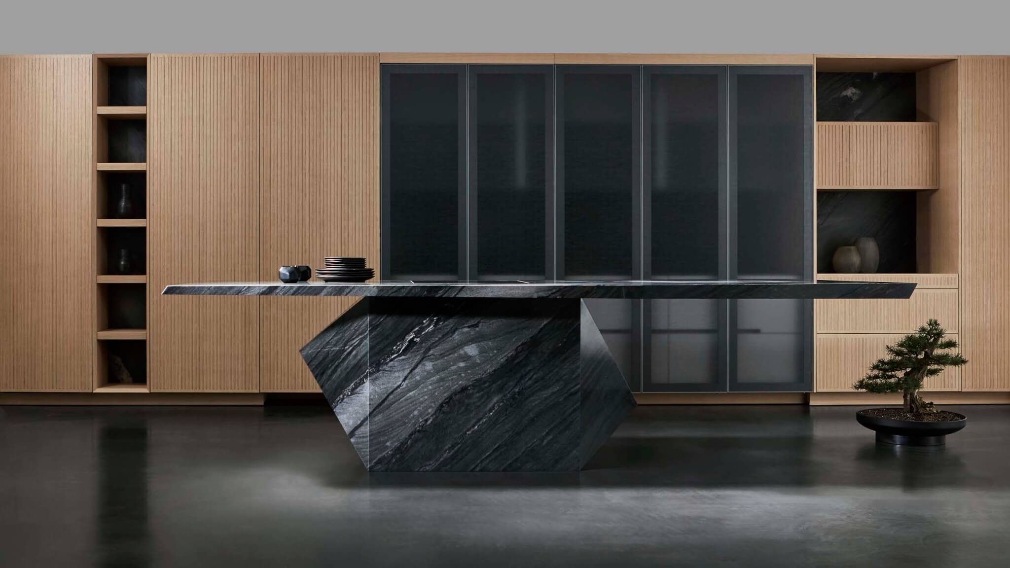 a kitchen counter resting on a black rock